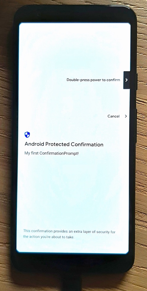 Photo of a phone showing a Android Protected Confirmation